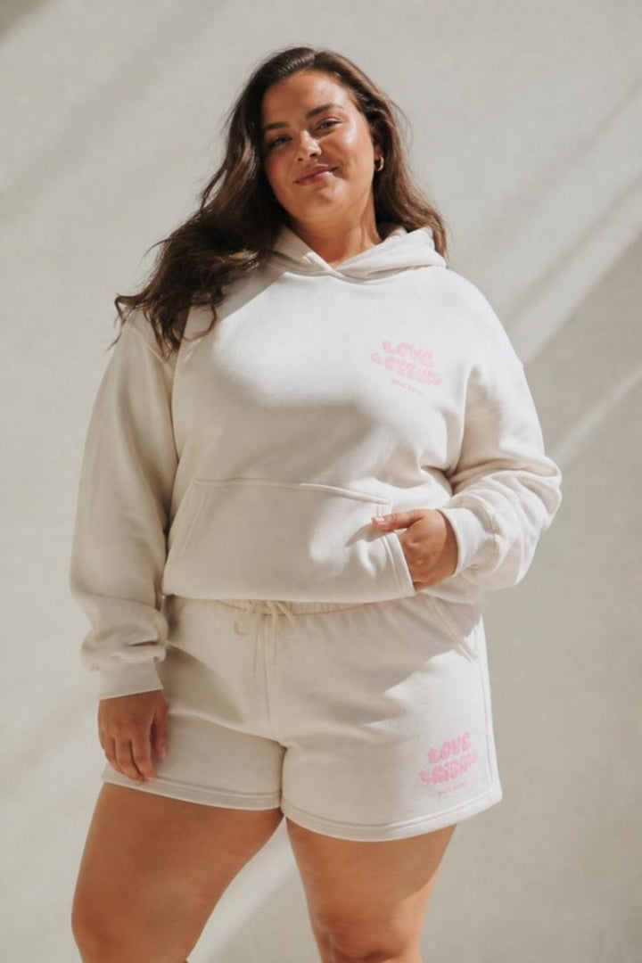 Size 3XL model wearing Love &amp; Leisure Adults Hoodie - Astro Candy