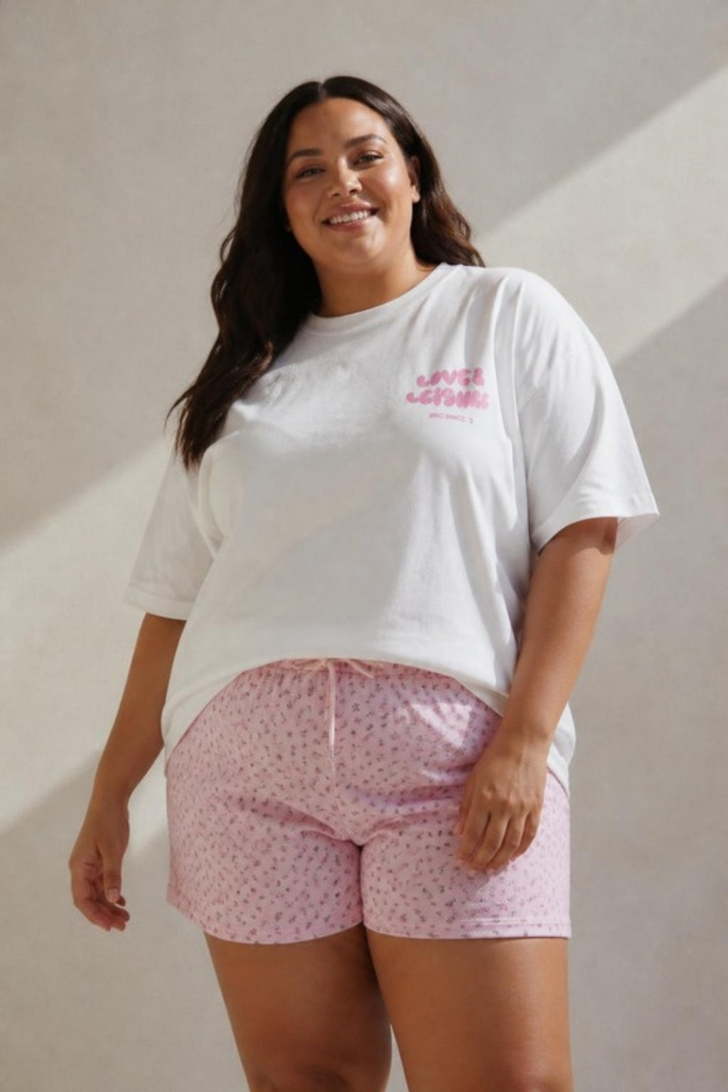Size 3XL model wearing Love &amp; Leisure Adults Oversized Tee - Bon Bon