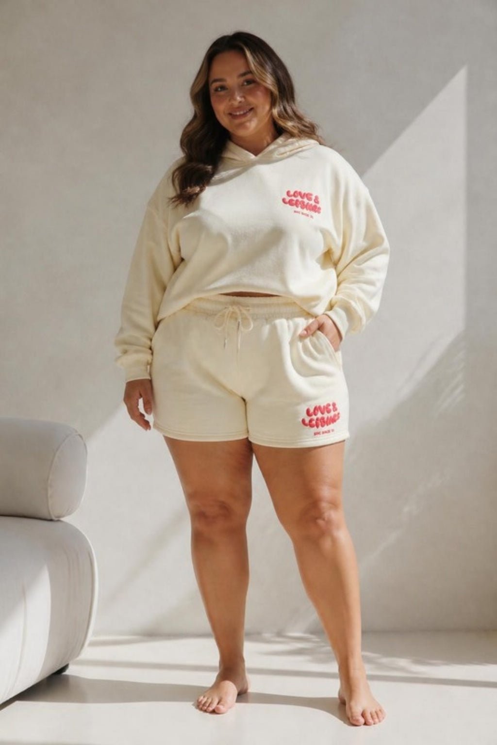 Size 3XL model wearing Love &amp; Leisure Adults Lounge Shorts - Cherry Cream