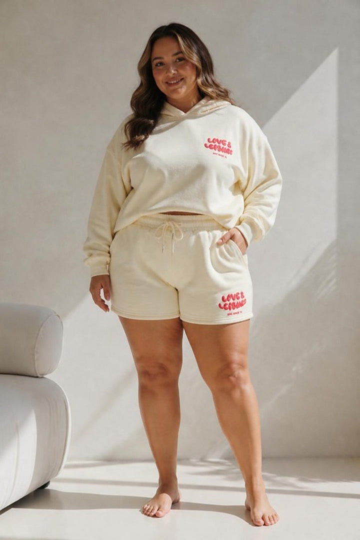 Size 3XL model wearing Love &amp; Leisure Adults Lounge Shorts - Cherry Cream