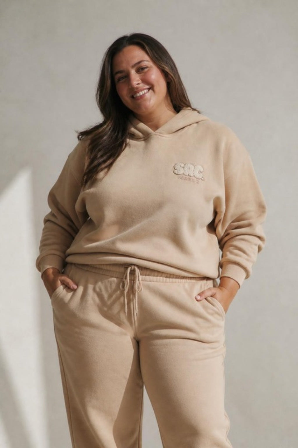 Size 3XL model wearing Cosy Club 2.0 Adults Hoodie - Latte