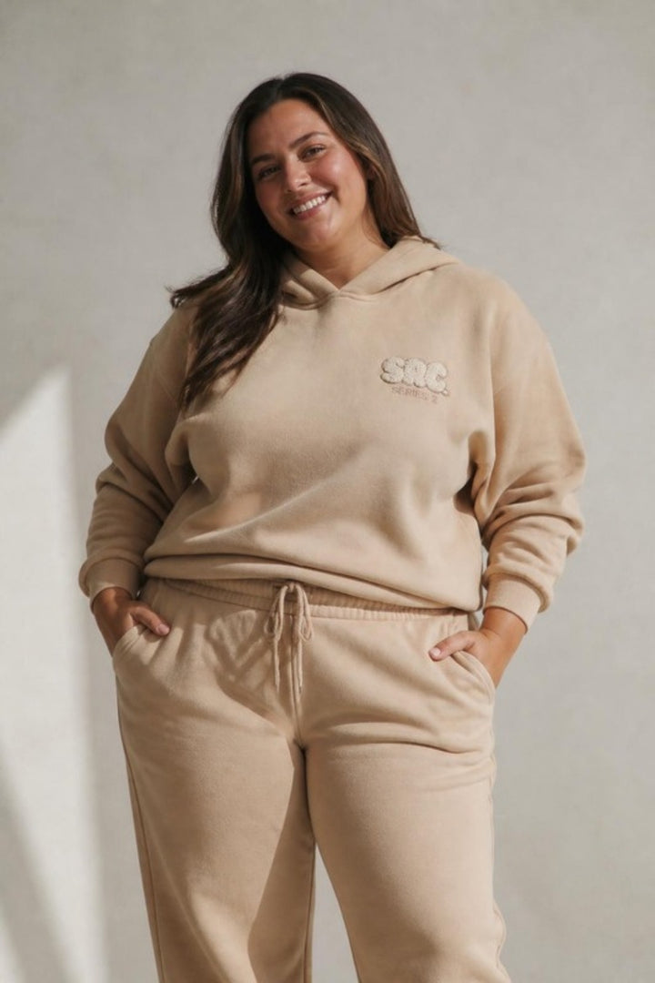 Size 3XL model wearing Cosy Club 2.0 Adults Hoodie - Latte