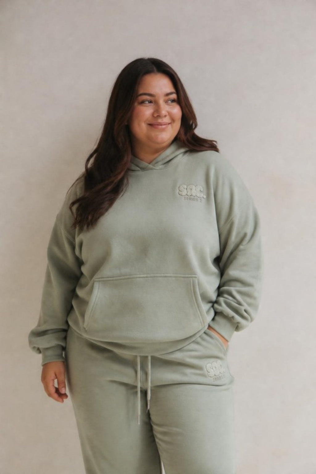 Size 3XL model wearing Cosy Club 2.0 Adults Hoodie - Sage