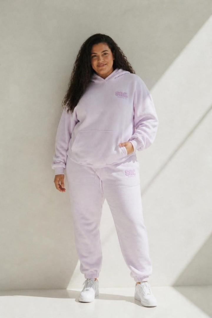 Size 3XL model wearing Cosy Club 2.0 Adults Sweatpants - Lilac