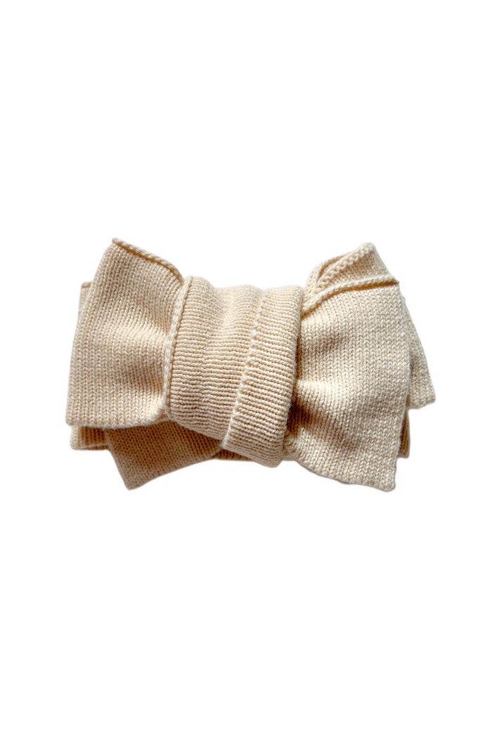 Knitted Oversized Bow in Oat, product shot on a white background