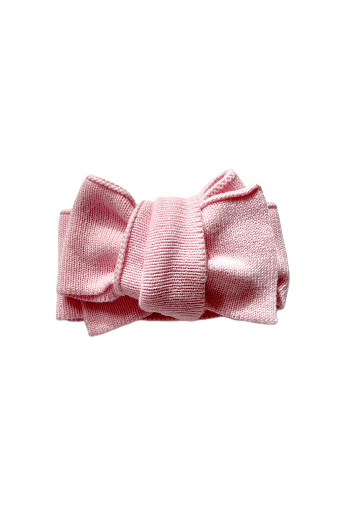 Knitted Oversized Bow in Baby Pink, product shot on a white background