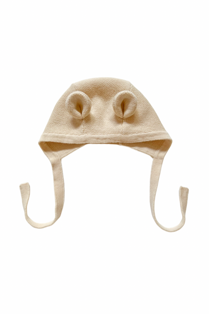 Knitted Teddy Bear Bonnet in Oat, product shot on a white background