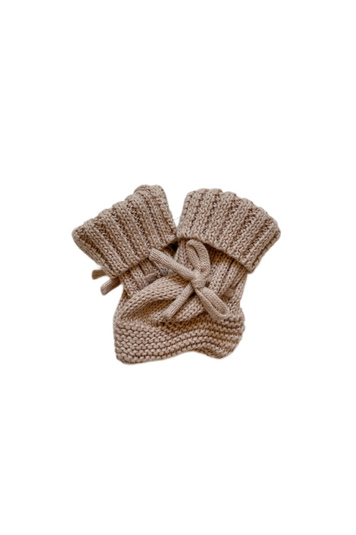 Knitted Booties in Fawn, product shot on a white background
