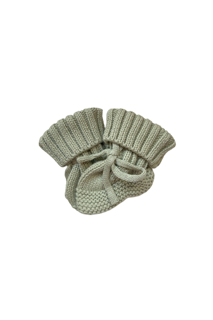 Knitted Booties in Sage, product shot on a white background